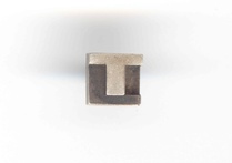 Koululle saatiin oma merkki, kun arkk.yo Pentti Heleniuksen [4094] suunnittelema TL-neliö voitti merkkiehdotusten suunnittelukilpailun keväällä. Hopeisen merkin ensimmäiset kappaleet jaettiin koulun 75-vuotisjuhlan yhteydessä 3. ja 4.10.1959 silloisille entisille ja nykyisille oppilaille.